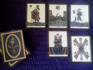 Le Tarot Noir, King of Pentacles, Moon, Fool, Empress, Ten of Swords