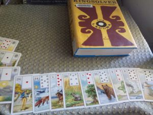 The Lenormand cards I used to forecast the plot of The Lacuna. I used an "open the book" method, with the Man as the significator, so that we could see what happened before the story begins and what plotline is about to unfold for this character. 