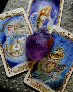 The King of Cups, Queen of Cups, and Knight of Cups, from Lisa Hunt's Fantastical Creatures Tarot