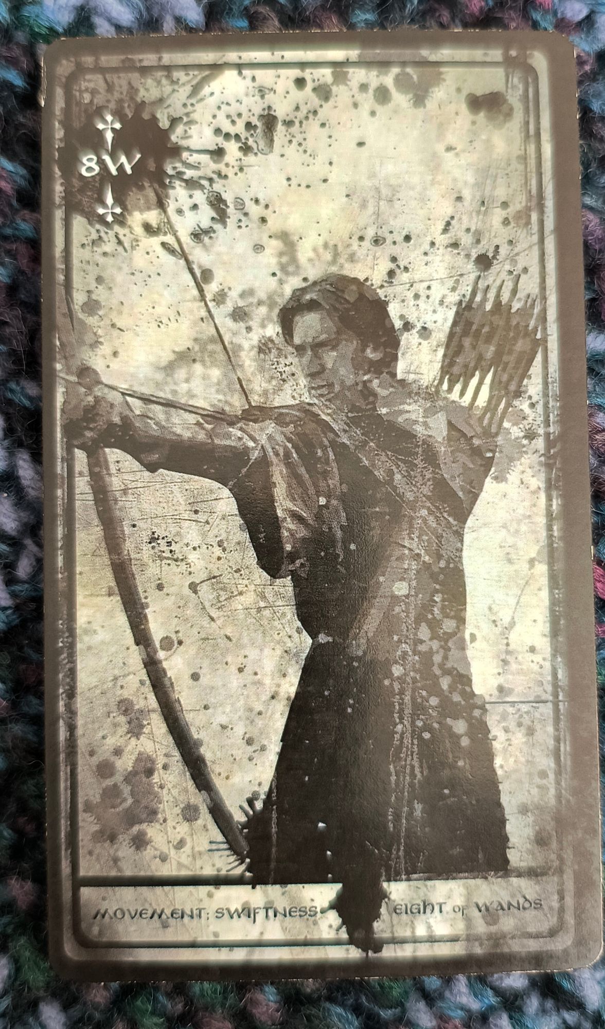 An archer is about to shoot an arrow.